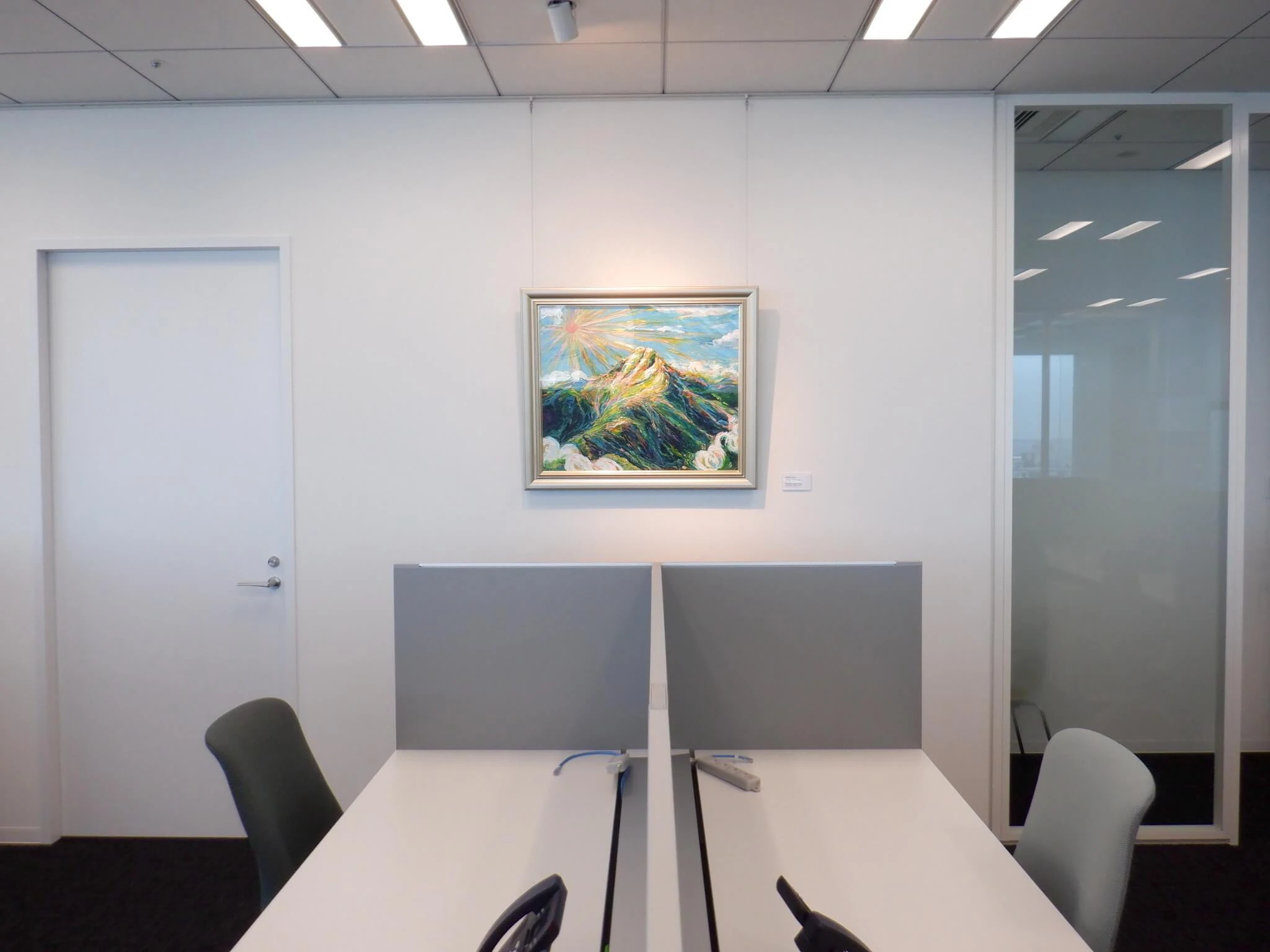 Painting on view in an office