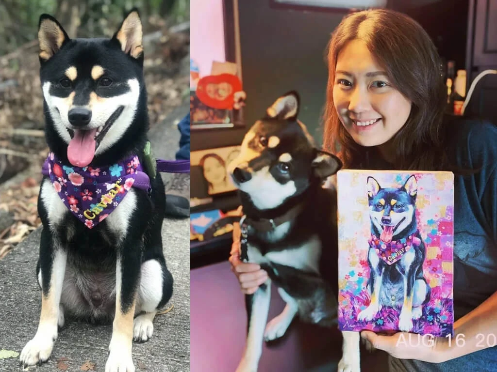 画像:ペットのオーダー絵画を持って、ペットと飼い主が写っています。